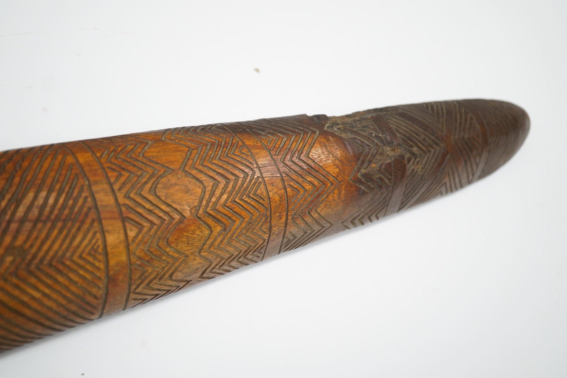 An Aboriginal carved hardwood parrying shield, 80cm. Condition - fair